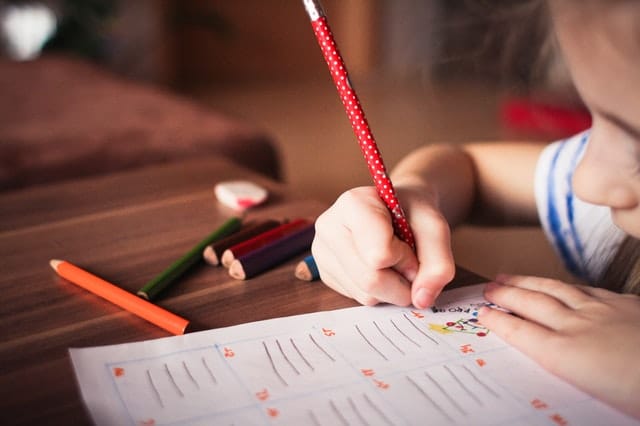 Child completing a school assignment 